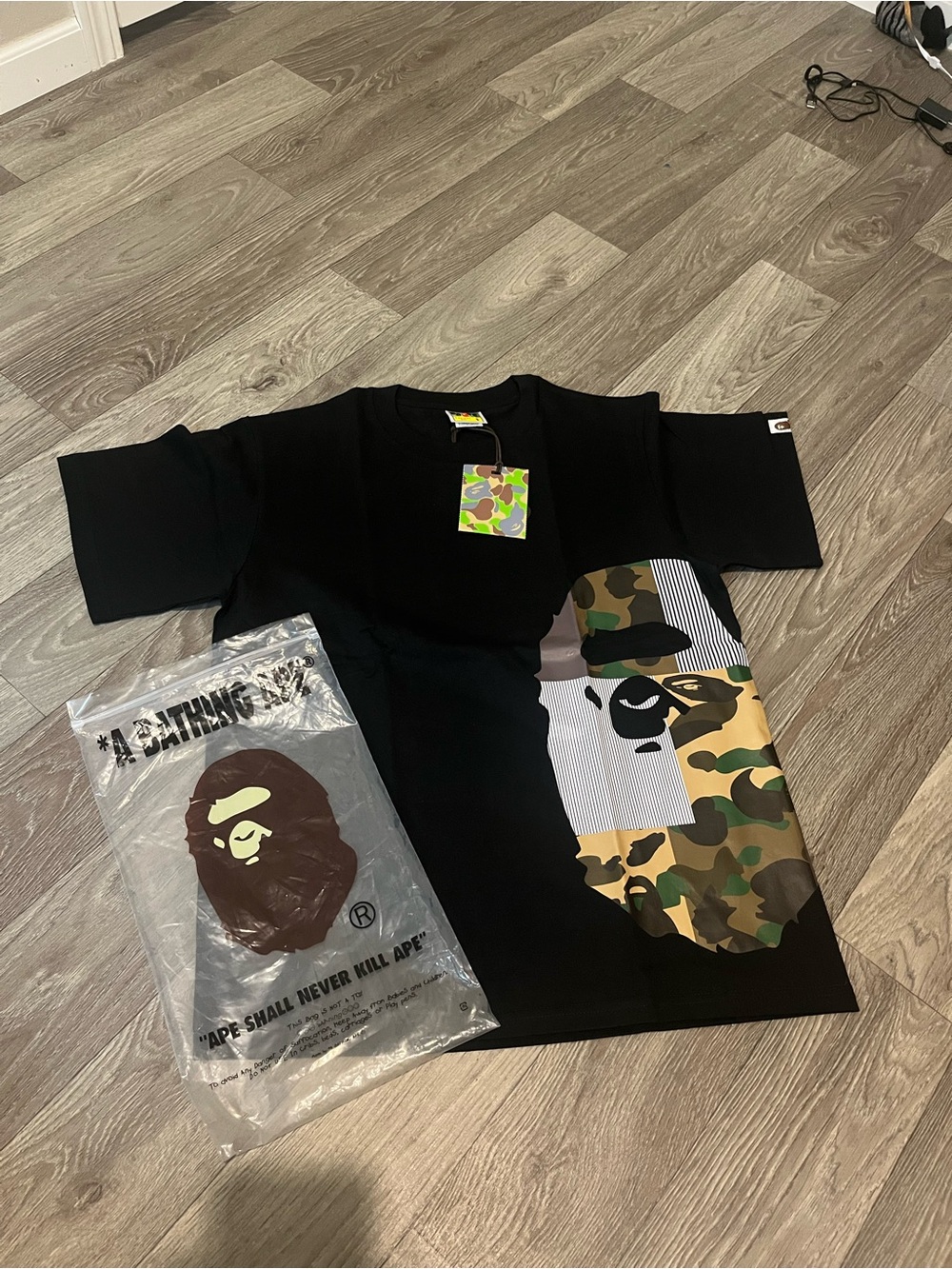 A Bathing Ape (BAPE) Black Short-Sleeve Tee with Camo Ape Panel